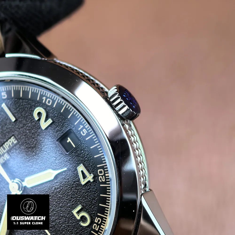 Close-up of the bezel and crown of the Patek Philippe Calatrava 5226G-001 showing case texture and crown design.