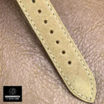 Close-up of the strap texture on the Patek Philippe Calatrava 5226G-001 — stitching and leather grain visible.