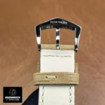 Patek Philippe Calatrava 5226G-001 white gold tang buckle — clasp shape and engraving details.