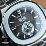 Dial close-up of the Nautilus Moon Phase 5726A-001 showing moon phase, date window, and textured dial.