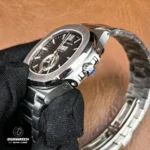 Side view of the case and crown on the Nautilus Moon Phase 5726A-001 showing crown detail and knurling.