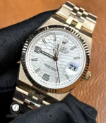 75-degree angled view of Rolex Land-Dweller 127335-0001 showcasing the dial, case depth and profile.