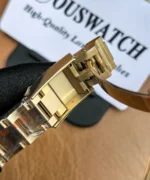 Close-up of the deployment clasp and buckle on the Rolex Daytona 116505 rose gold female super clone.