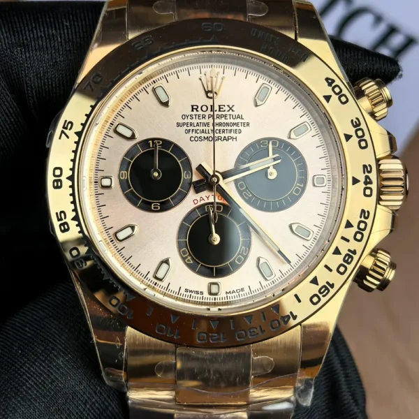 Straight-on front view of the Rolex Daytona 116505 rose gold female super clone.