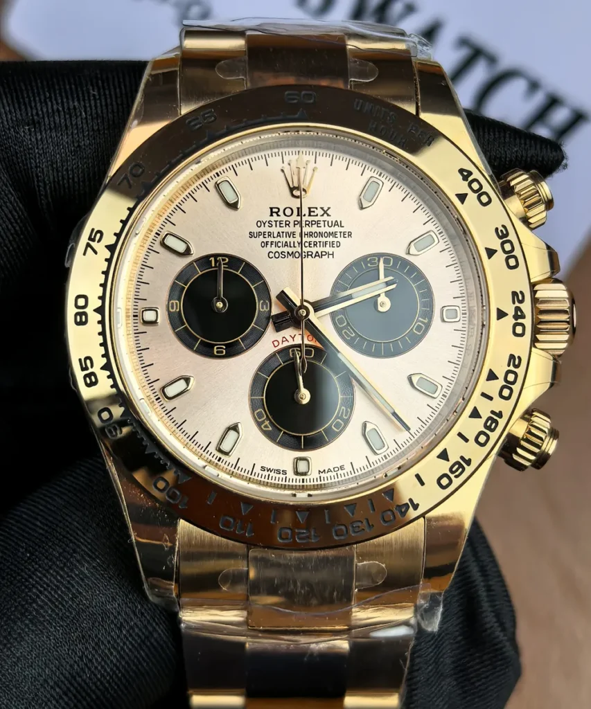 Straight-on front view of the Rolex Daytona 116505 rose gold female super clone.