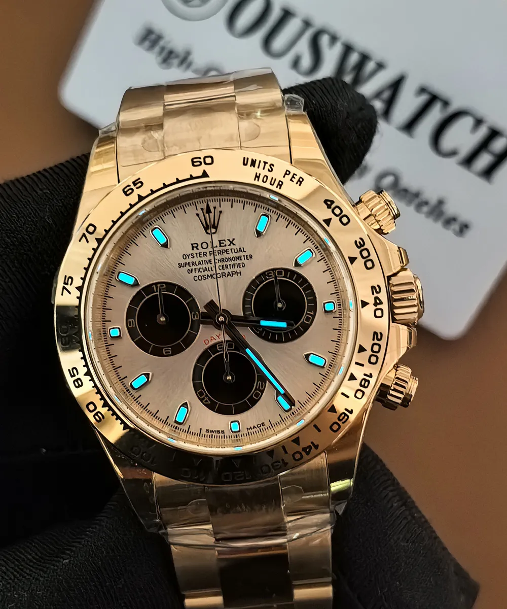 Rolex Daytona 116505 rose gold female super clone displayed in low-light conditions.