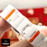 Close detail of the bracelet on the Rolex Custom Daytona Panda, showing link construction and surface finish.