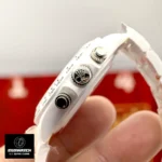 Detail of the chronograph pushers and crown on the Rolex Custom Daytona Panda white ceramic case.