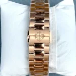 Close-up detail of the rose gold bracelet and clasp of the Patek Philippe Nautilus 5990/1R.