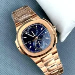 Three-quarter (120°) angle shot of the 5990/1R Nautilus rose gold travel-time watch highlighting the case and bracelet.