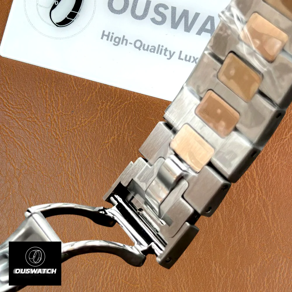 Interior side of the two-tone bracelet on a Patek Philippe Cubitus 5821/1AR, showing clasp construction and inner finishing.