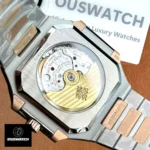 Rear view of Patek Philippe Cubitus 5821/1AR two-tone watch showing the caseback and attachment points of the bracelet.