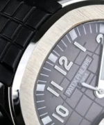 Macro shot of the dial logo area on the Aquanaut 5167A-001 PPF super clone, showing the printed/applied logo and nearby markers.