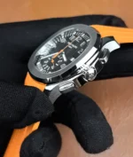 Detail view of the crown and chronograph pushers on the Aquanaut 5968A, showing machining and grip.