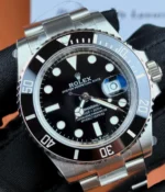 Close-up of the black dial on the Rolex Submariner 126610LN