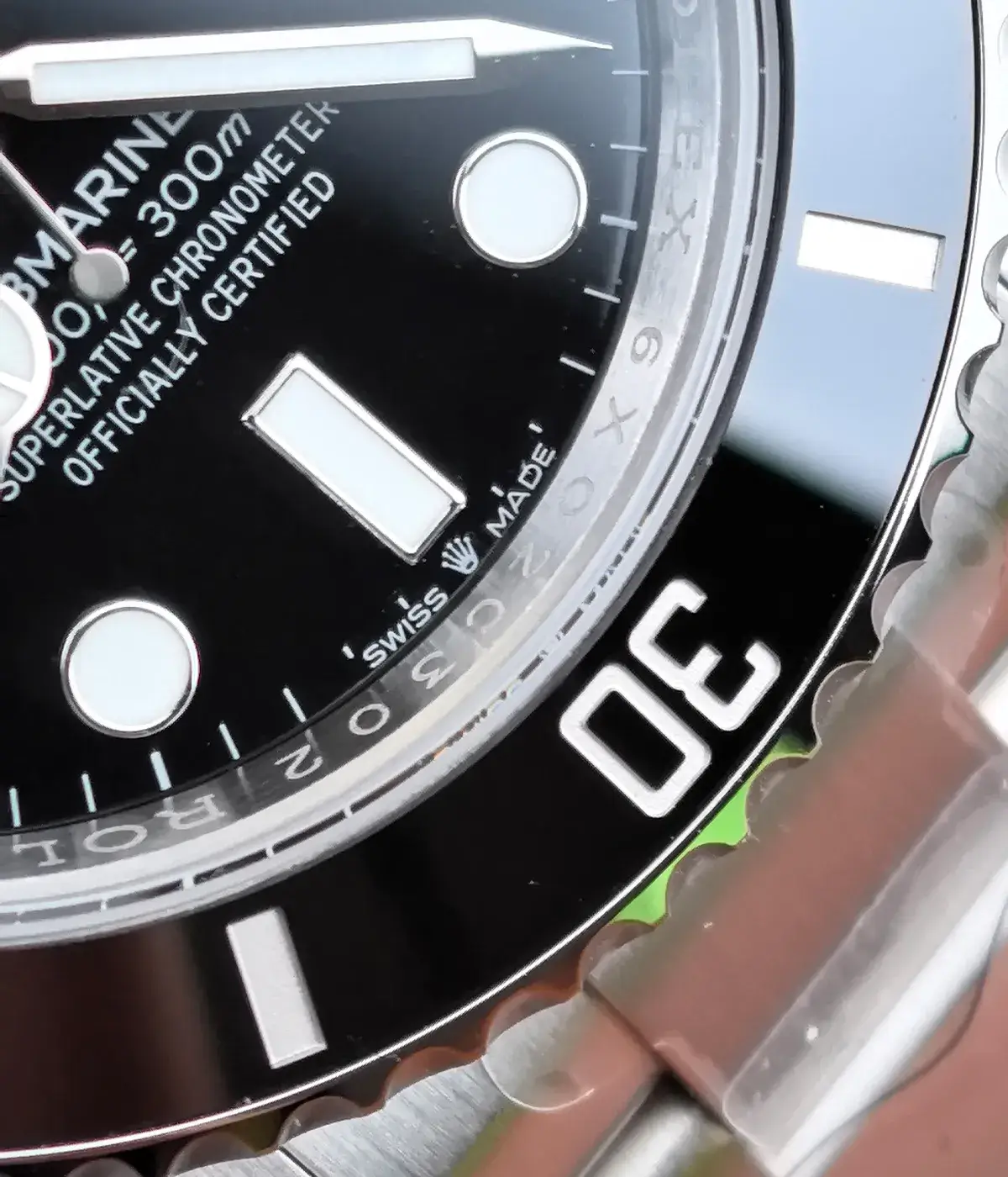 Close-up of the 6 o’clock section on the Rolex Submariner 126610LN dial