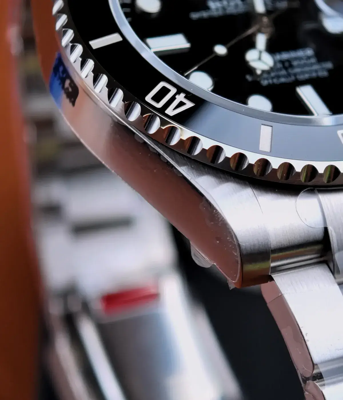 Detailed view of the stainless steel case and bezel on the Rolex Submariner 126610LN