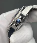 Side angle view of the crown and case on the Rolex white gold Pepsi 126719BLRO-0003 watch.
