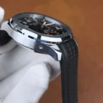 Side detail of the lugs of the Patek Philippe 5968A, showing polished stainless steel finish and strap attachment