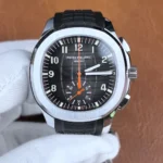 Close-up front view of the Patek Philippe Aquanaut 5968A-001 chronograph watch, highlighting the black embossed dial and orange chronograph hand