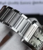Detail view of the bracelet on the Cartier Tank Française W51008Q3 watch.