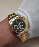 Rolex Yellow Gold Daytona 126508-0004 watch shown on the wrist for a wearing view.