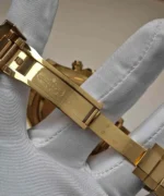 Open folding clasp view of the Rolex Yellow Gold Daytona 126508 bracelet.