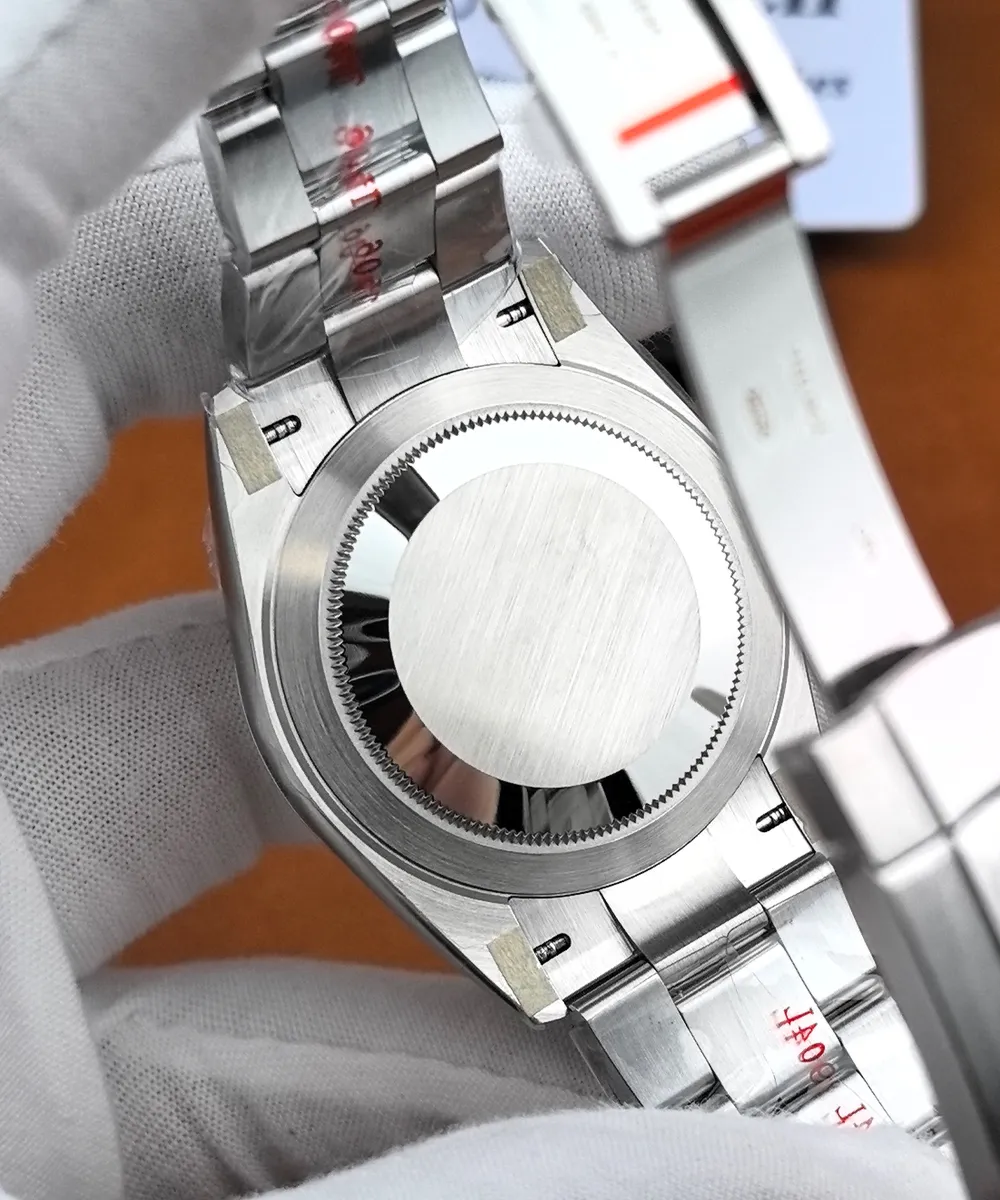 Rear view of the Rolex Datejust 126300 showing its brushed solid caseback, polished caseback ring, and Oyster bracelet attachments.